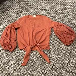 Love Stitch tie top with puffed eyelet sleeves